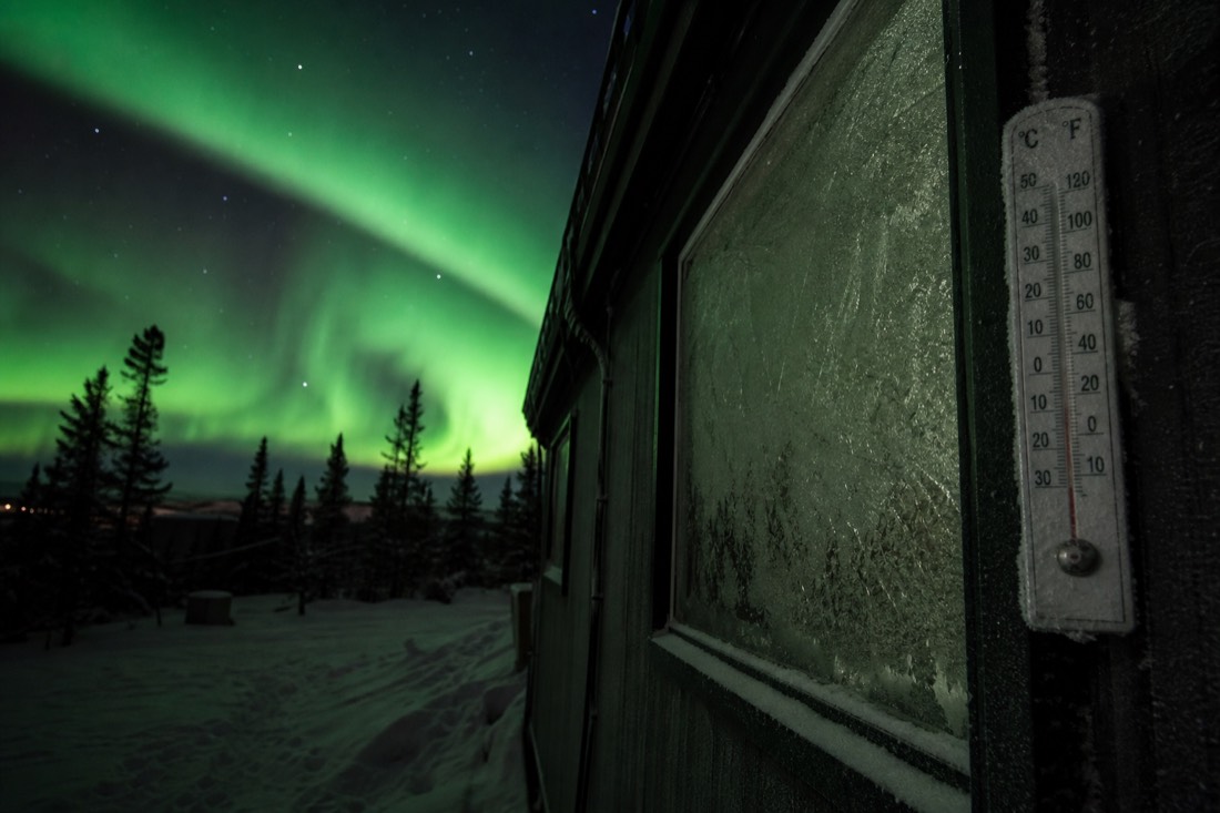 Thermometer reading deep in the minus thirties against a frosted window in Yellowknife